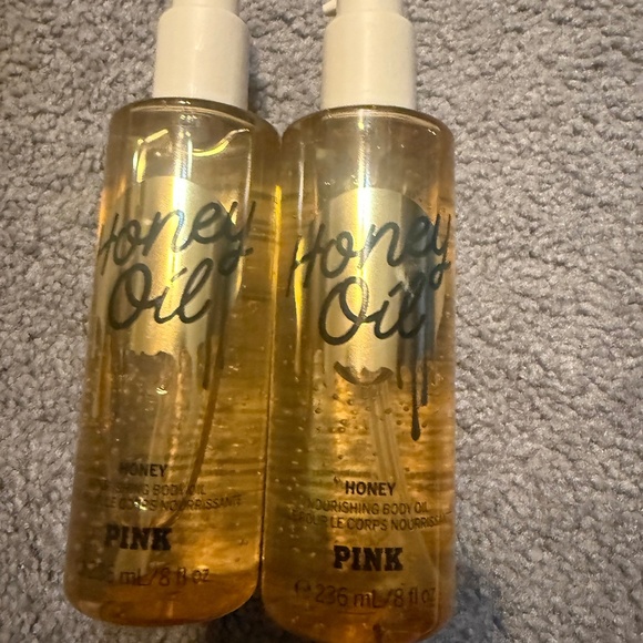 Pink body oil - Picture 1 of 2